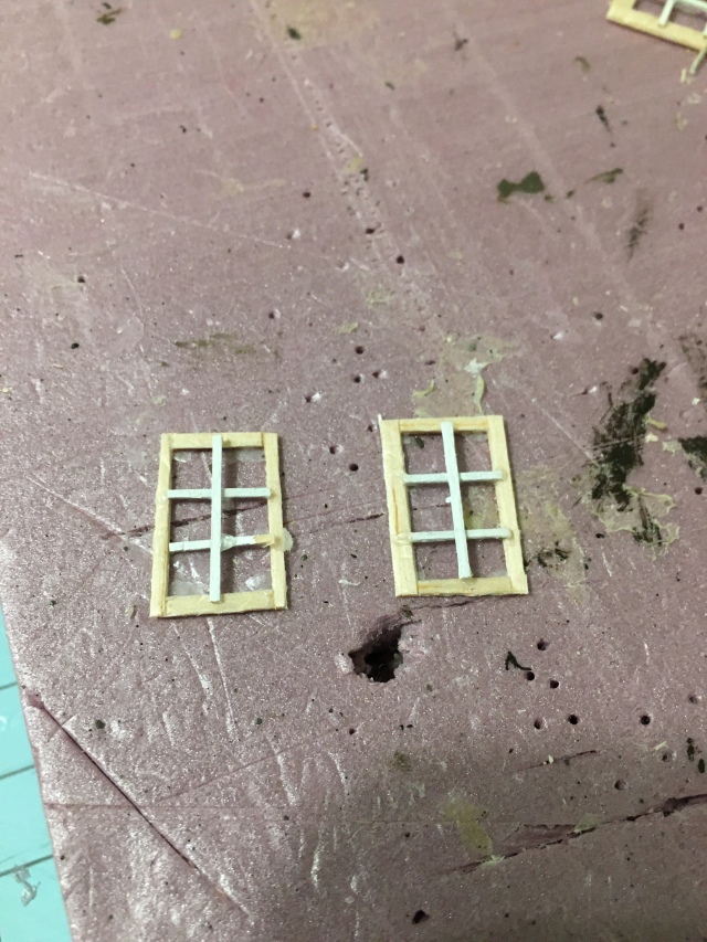 Scratch built HO scale balsa windows with trimming finished.